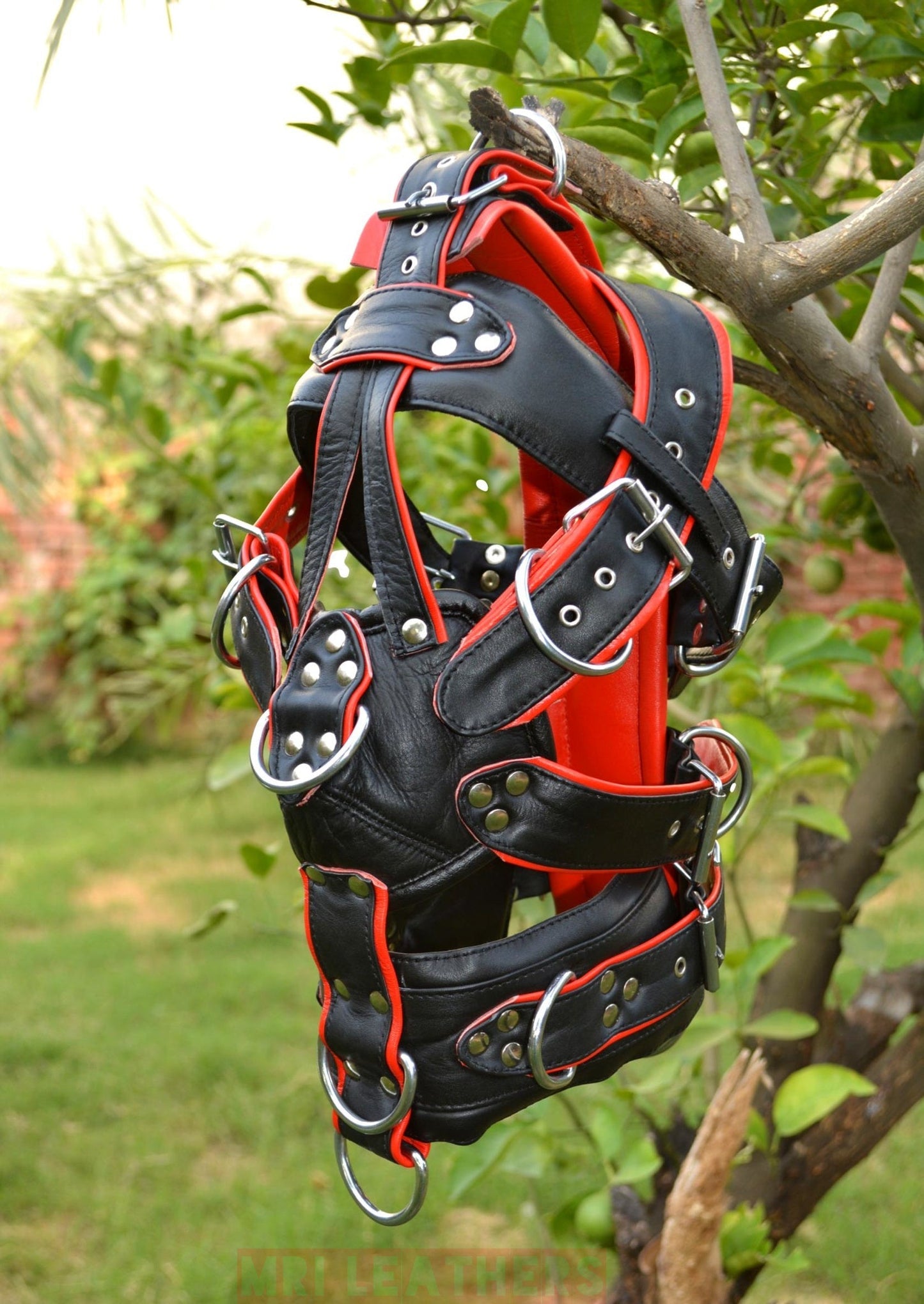 Leather Gear Face hood with D-rings and adjustable belts for extreme bondage.