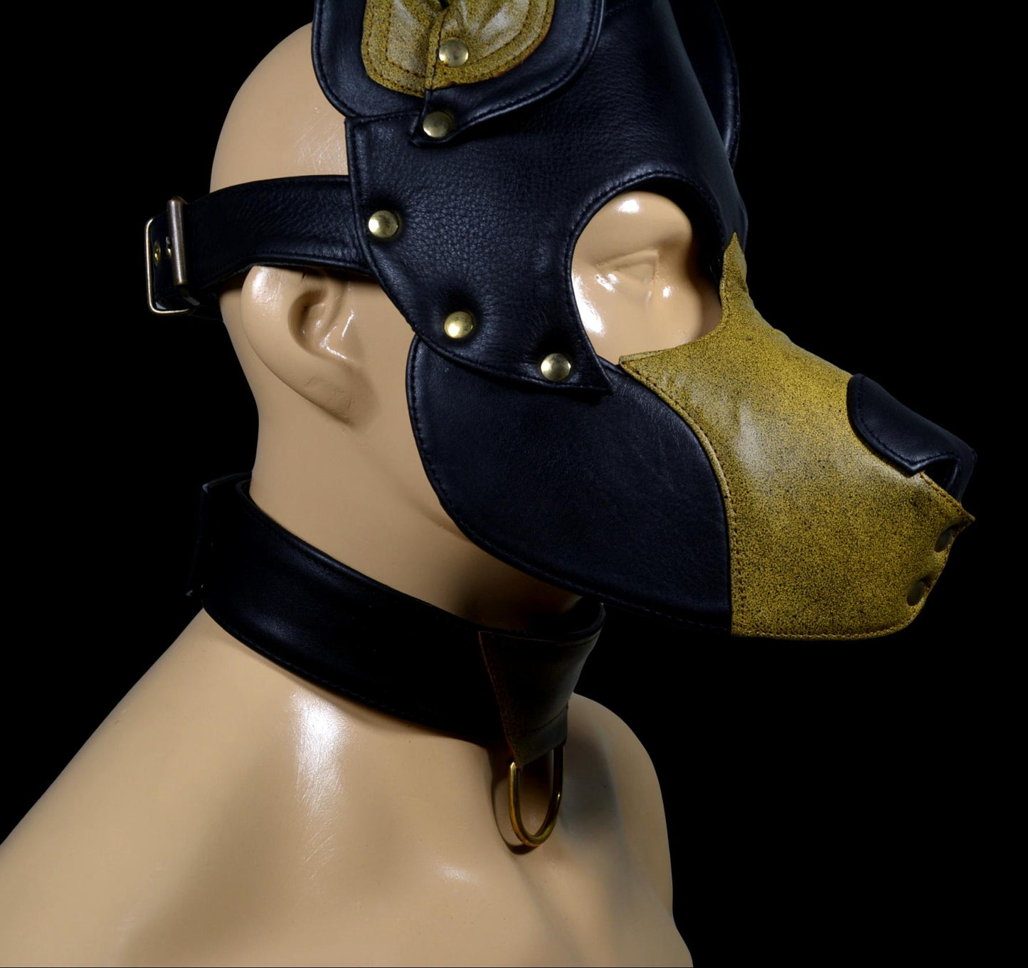 Leather pup hood with adjustable buckle and stainless snaps.