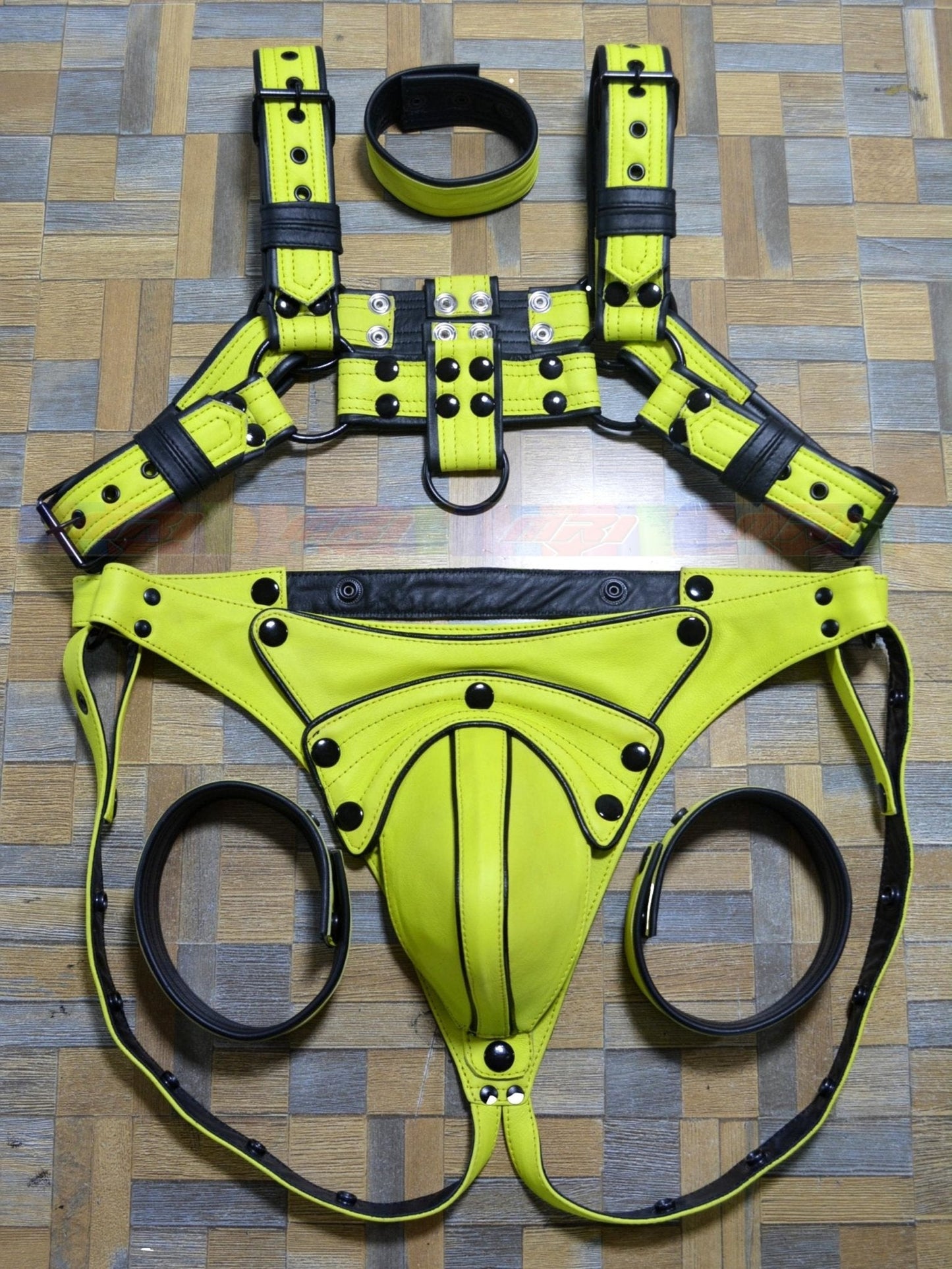 Men's adjustable leather harness with buckle and arm bands, made of top-quality chrome leather and stainless steel hardware.