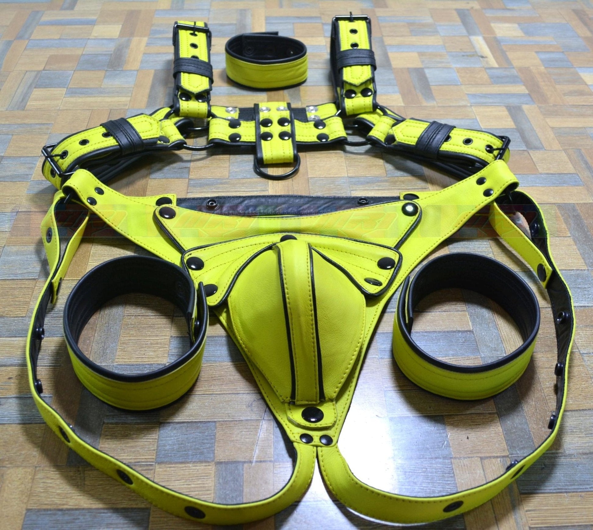 Men's yellow leather harness set with adjustable buckles and stainless steel hardware.
