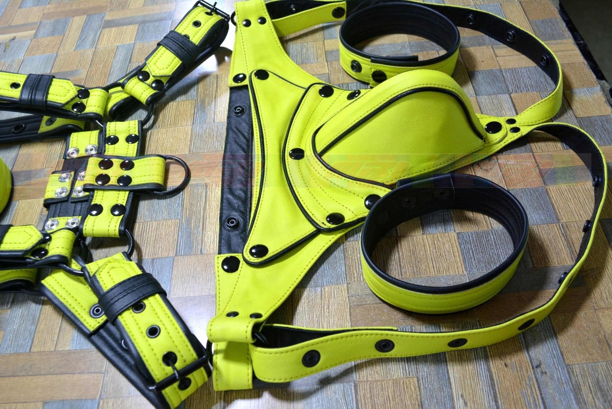Men's adjustable leather body harness with stainless steel hardware, featuring bright yellow and black design.