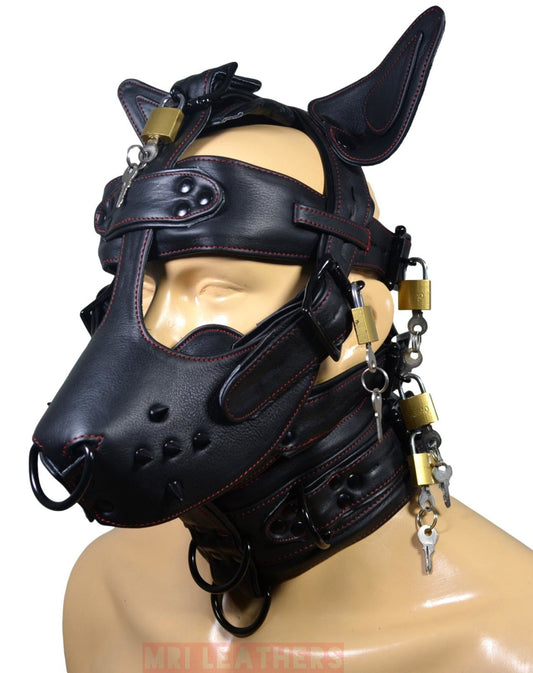 Leather gear face hood with bondage muzzle, gag rings, and locking buckles in black.