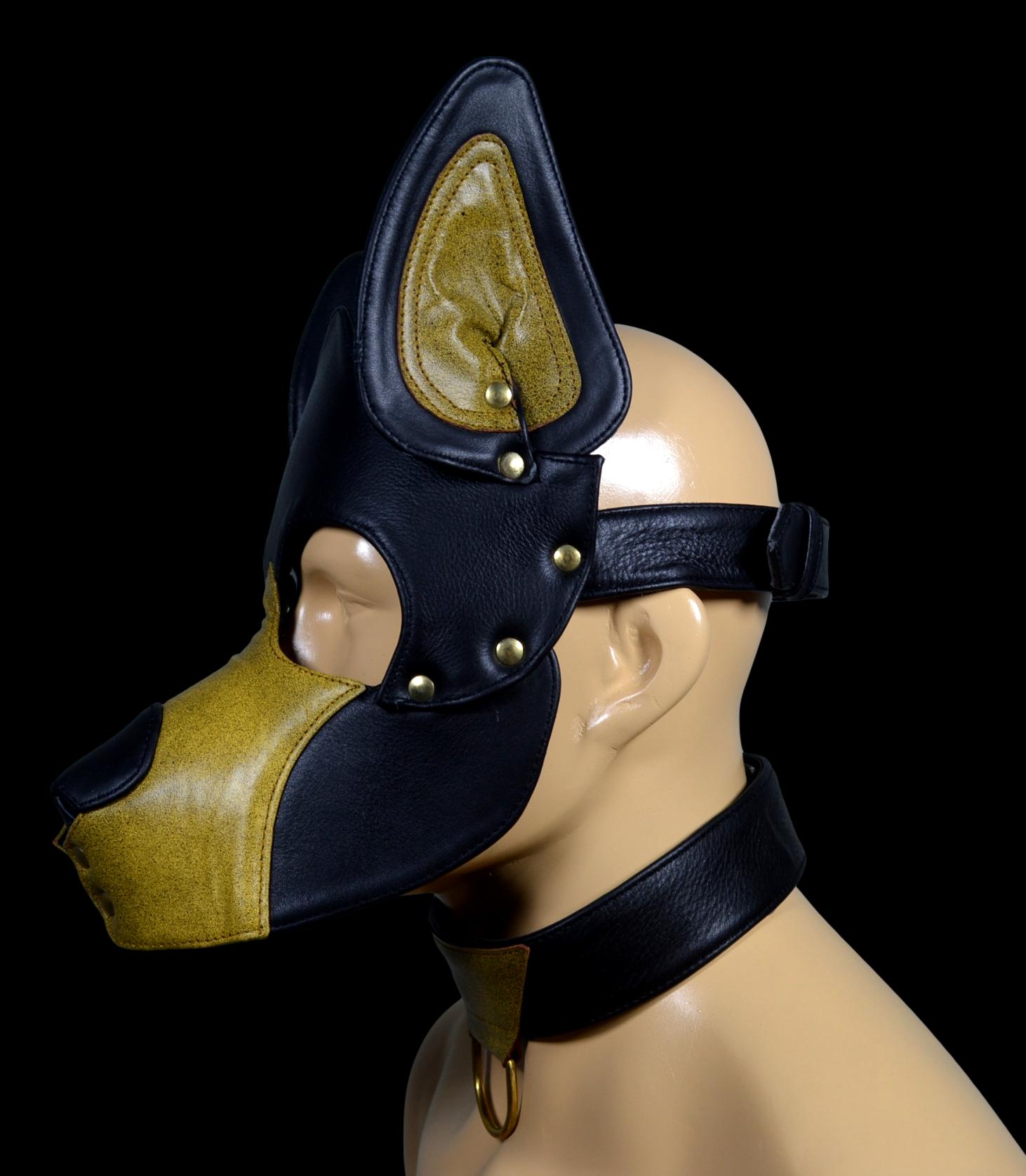 Leather pup hood mask with adjustable buckle and stainless snaps.