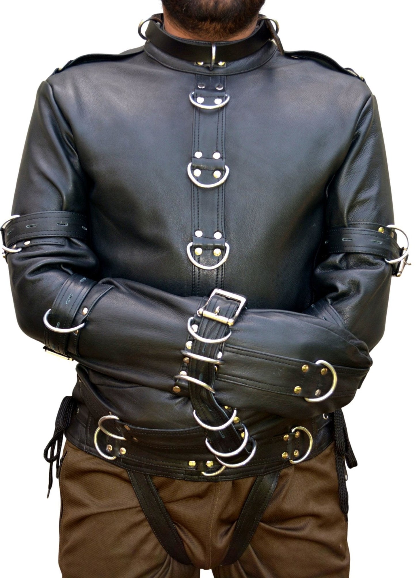 Real leather straitjacket with D-rings, riveted straps, and locking buckles for full restraint.